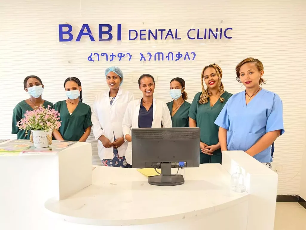 Ethiopian female dental doctors posing for a camera.